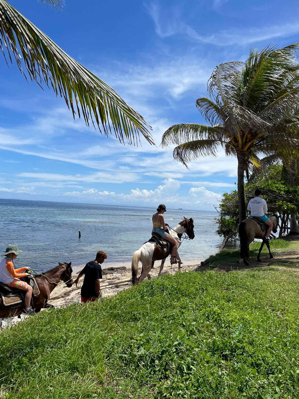 Relaxing on beach after horseback ride